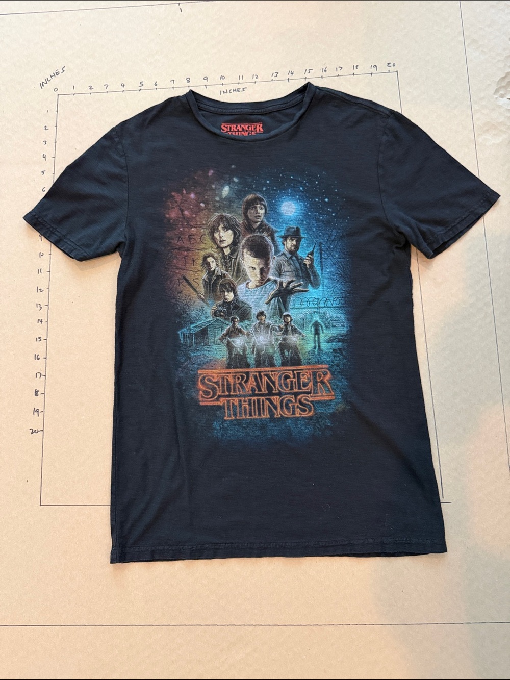 Netflix Stranger Things Black Graphic Tee with Blue and Orange Print